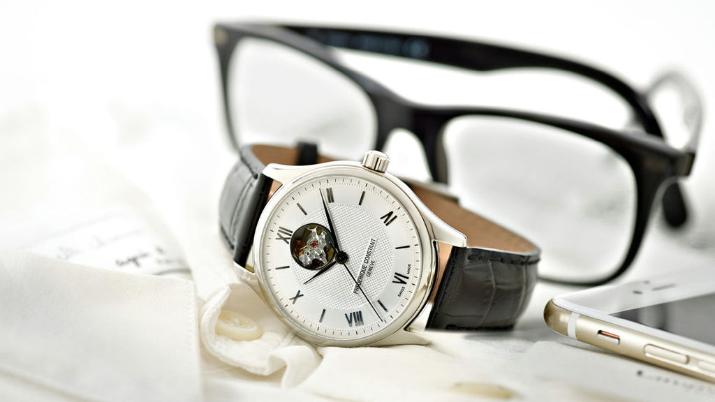 CLASSICS HEART BEAT AUTOMATIC SILVER DIAL OPEN HEART ON BLACK LEATHER