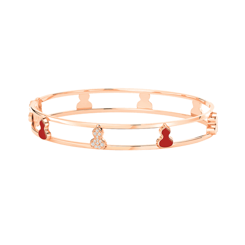 Qeelin Wulu bangle in 18K rose gold with diamonds and red agate